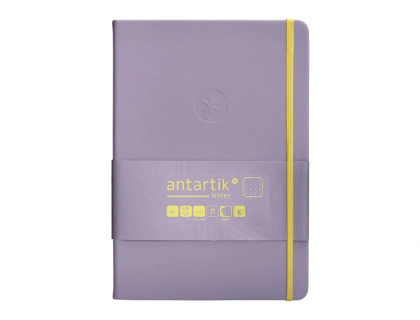 CUADERNO TAPA BLANDA ANTARTIK A5 PUNTOS MORADO Y AMARILLO